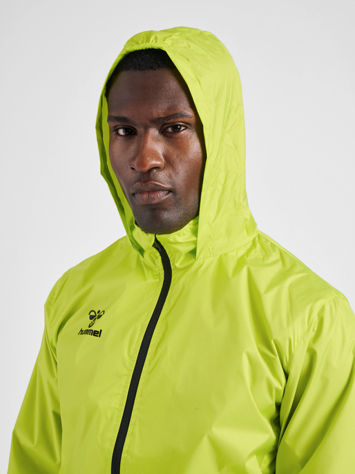 hmlCORE XK SPRAY JACKET, LIME POPSICLE, model