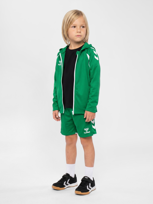 hmlCORE 2.0 ZIP HOODIE KIDS, JELLY BEAN/WHITE, model