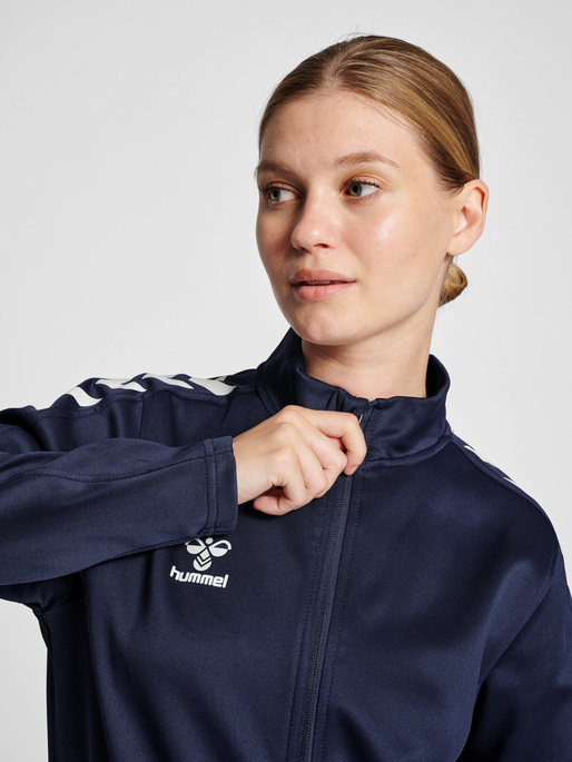 hmlCORE XK POLY ZIP SWEAT WOMAN, MARINE, model