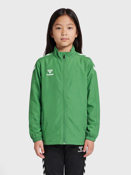 hmlCORE XK MICRO ZIP JACKET KIDS, JELLY BEAN, model