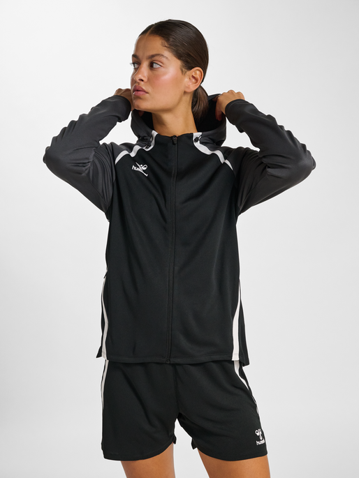 hmlLEAD 2.0 ZIP HOODIE WOMAN, BLACK/ASPHALT, model