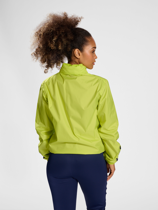 hmlCORE XK SPRAY JACKET, LIME POPSICLE, model