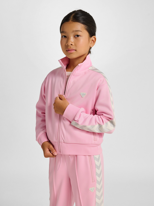 hmlJR REG POLY TAPE GIRL ZIP JACKET, ROSEATE SPOONBILL, model