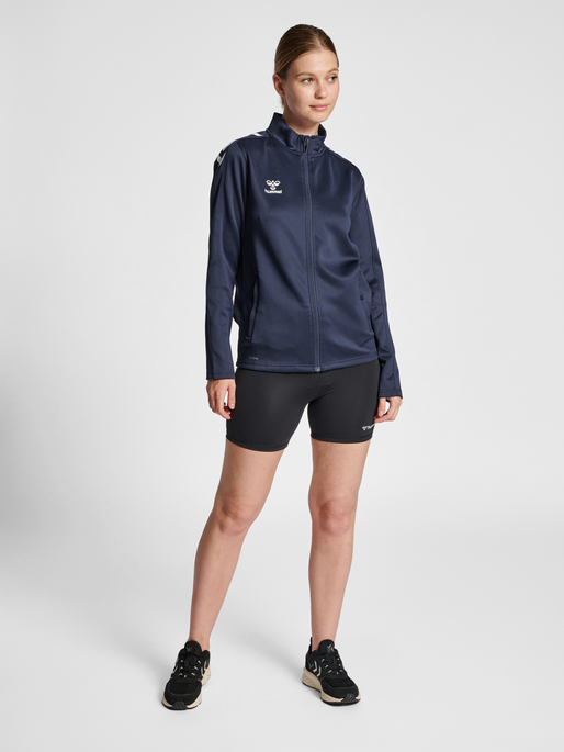 hmlCORE XK POLY ZIP SWEAT WOMAN, MARINE, model