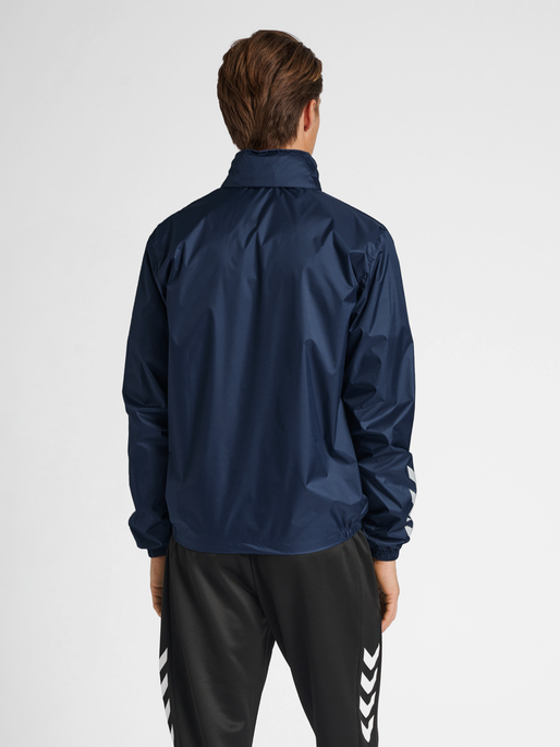 hmlCORE XK SPRAY JACKET, MARINE, model