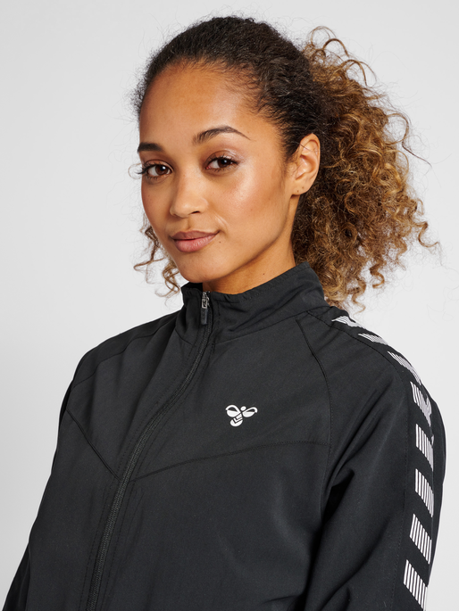 hmlGG12 TRACK JACKET WOMAN, BLACK, model