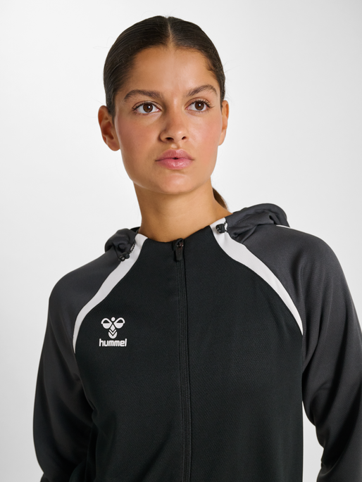 hmlLEAD 2.0 ZIP HOODIE WOMAN, BLACK/ASPHALT, model